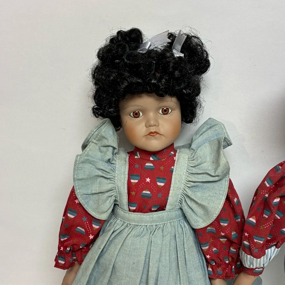 Delton Product Corp. Porcelain Brown Boy Girl Dolls Stands Matching Outfits